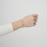 Sterling Silver Modern Twist Ball Bangle Bracelet